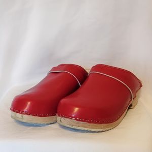 Red wooden clogs